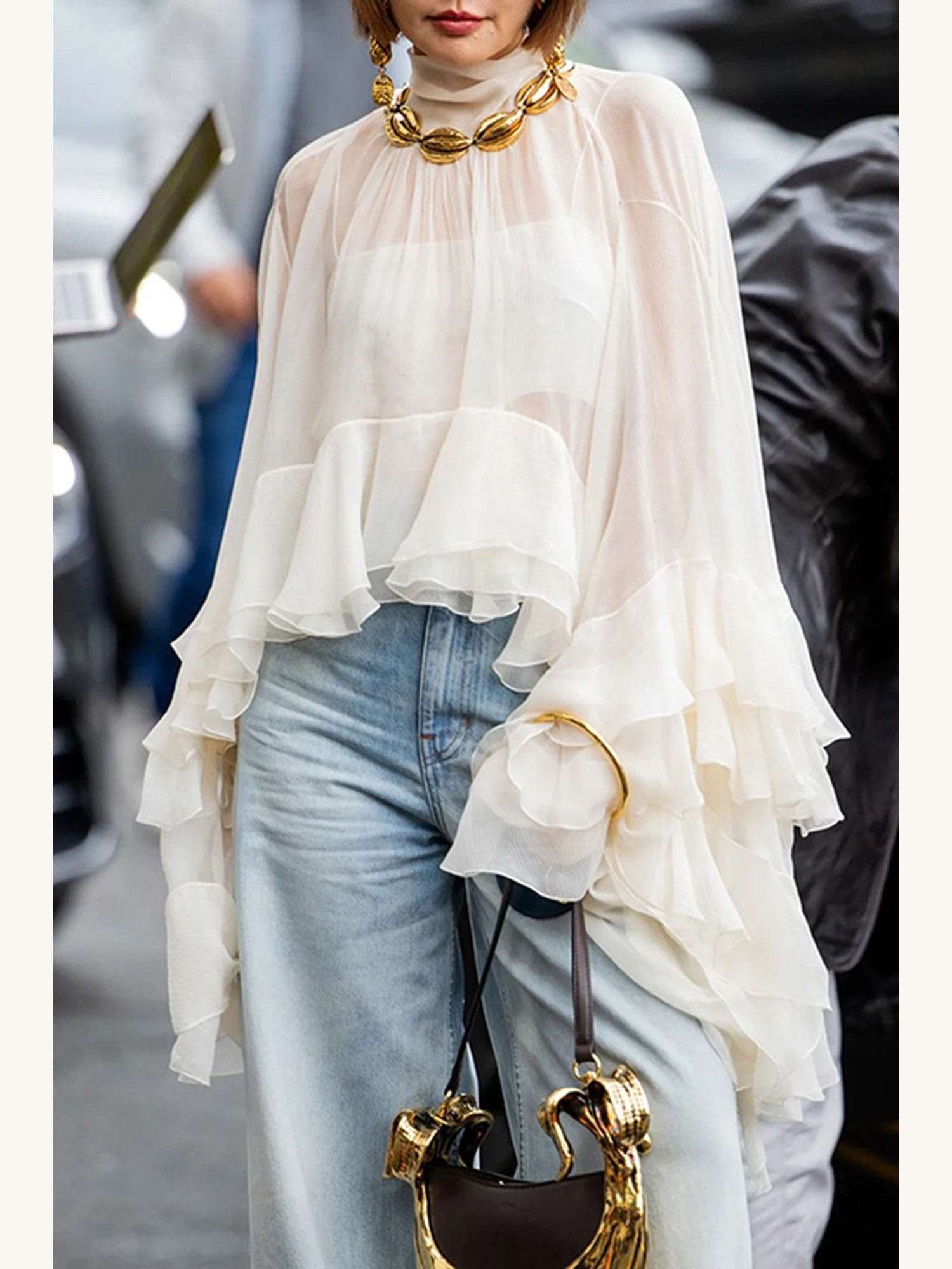 Look 01 — Ruffled sheer mock-neck blouse